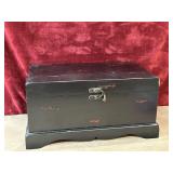 Distressed wooden box lined in maroon felt