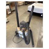 Beige RIDGID wet/dry shop vacuum with two
