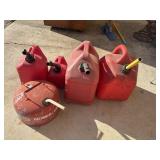 Assorted mix of gas cans.