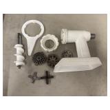 Disassembled parts of a KitchenAid Food Grinder
