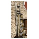 Outdoor ladders. Yellow fiberglass stepladder and