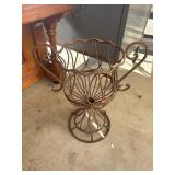 Old rustic wrought iron urn planter.