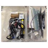 2 Storage bins containing automotive electrical
