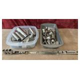 Bundle : assortment of loose, chrome-plated metal