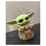 Handmade, artisan-crafted clay figurine of Grogu.