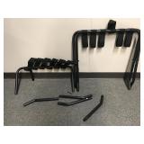 Two Black Folding Luggage Racks