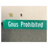 Misspelled Guns Prohibited Sign