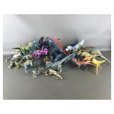 Collection Of Plastic Dinosaur Toys