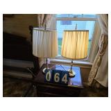 pair of brass lamps