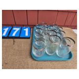 silver rimmed roly poly glasses