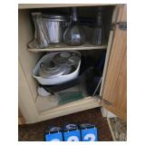 contents of cupboard under sink