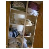 contents of cupboard linene lots of towels