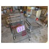 2 black metal deck chairs
