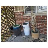 flower pots and buckets on porch