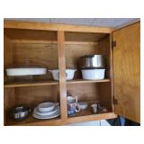 contents of kitchen cupboards and the counter