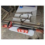 pitchforks log tongs weedeater lot