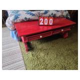 red coffee table with drawer