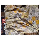 unfinnished quilt just the top of it