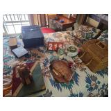 basket suitcase pull toy items on bed