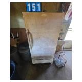 upright freezer in workshop