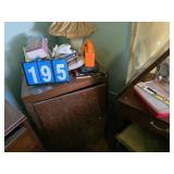 sewing machine and cabinet in the corner