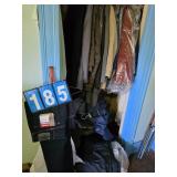 Closet full of clothes some new leasure suits