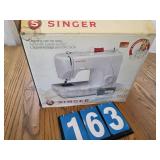 singer sewing machine in the box