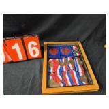 shooting medals in display