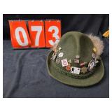shooting hat with pins and medals