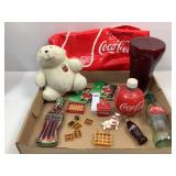 Assorted Coca-Cola Items in Coca-Cola Plastic Bag