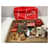Assorted Coca-Cola Items in Coca-Cola Plastic Bag