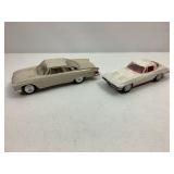 2 Plastic Cars - Larger one is Chrysler Corp.