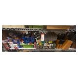 1 shelf of assorted kitchenware with spices