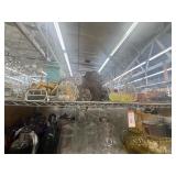 Top shelf of metal wire plant stands