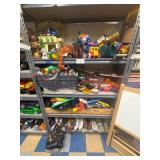4 shelves of assorted kids toys