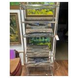 Glass cabinet with lamp logs
