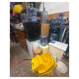 Lot of assorted mini fridges and water jugs