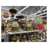 Top shelf of brass decor - see description