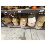 1 shelf of assorted lamp shades