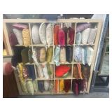 Lot of assorted pillows with shelf