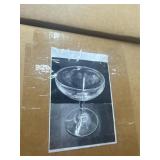 Top shelf of assorted glass cups in boxes