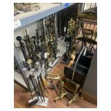 Bottom shelf of fireplace accessories