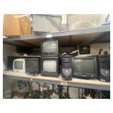 1 shelf of assorted electronics