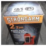 AS NEW STRONGARM 2 TON HYDRAULIC BOTTLE JACK