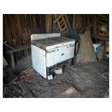 Lot in Red Shed: Wood Stove / 4 Tables/ Misc.