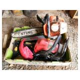 Box of chain saw parts (Stihl & Homelite)