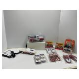 Twelve Collectible Vehicles and Toy Car Phone