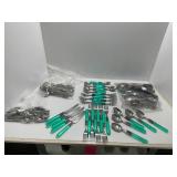 Flatware With Green Handles and Assorted Pieces