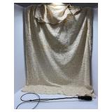 Wire Rug Beater and Lace Tablecloth