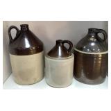 Three Stoneware Jugs with Handles